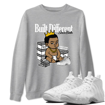 Built Different Since Birth sneaker match t-shirt styled to complete your fit with the Air Foamposite One Triple White sneakers, shown in Heather Grey 1.