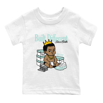 Built Different Since Birth baby and kids t-shirt crafted for little sneakerheads to shine with the Air Jordan 11 Igloo sneakers, displayed in White 2.