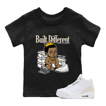 Built Different Since Birth baby and kids t-shirt crafted for little sneakerheads to shine with the Air Jordan 3 Pure Money sneakers, displayed in Black 1.