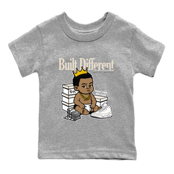 Built Different Since Birth baby and kids t-shirt crafted for little sneakerheads to shine with the Air Jordan 3 Pure Money sneakers, displayed in Heather Grey 2.