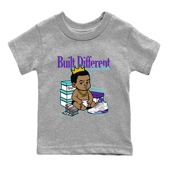 Built Different Since Birth baby and kids t-shirt crafted for little sneakerheads to shine with the Air Jordan 5 Grape sneakers, displayed in Heather Grey 2.