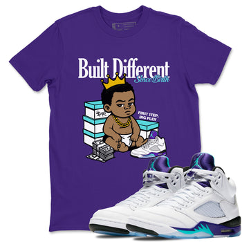 Built Different Since Birth sneaker match t-shirt styled to complete your fit with the Air Jordan 5 Grape sneakers, shown in Purple 1.
