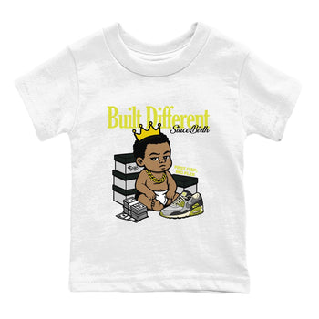 Built Different Since Birth baby and kids t-shirt crafted for little sneakerheads to shine with the Air Max 90 Cyber sneakers, displayed in White 2.