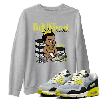 Built Different Since Birth sneaker match t-shirt styled to complete your fit with the Air Max 90 Cyber sneakers, shown in Heather Grey 1.