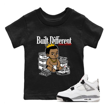 Bulit Different Since Birth baby and kids t-shirt crafted for little sneakerheads to shine with the Air Jordan 4 White Cement sneakers, displayed in Black 1.