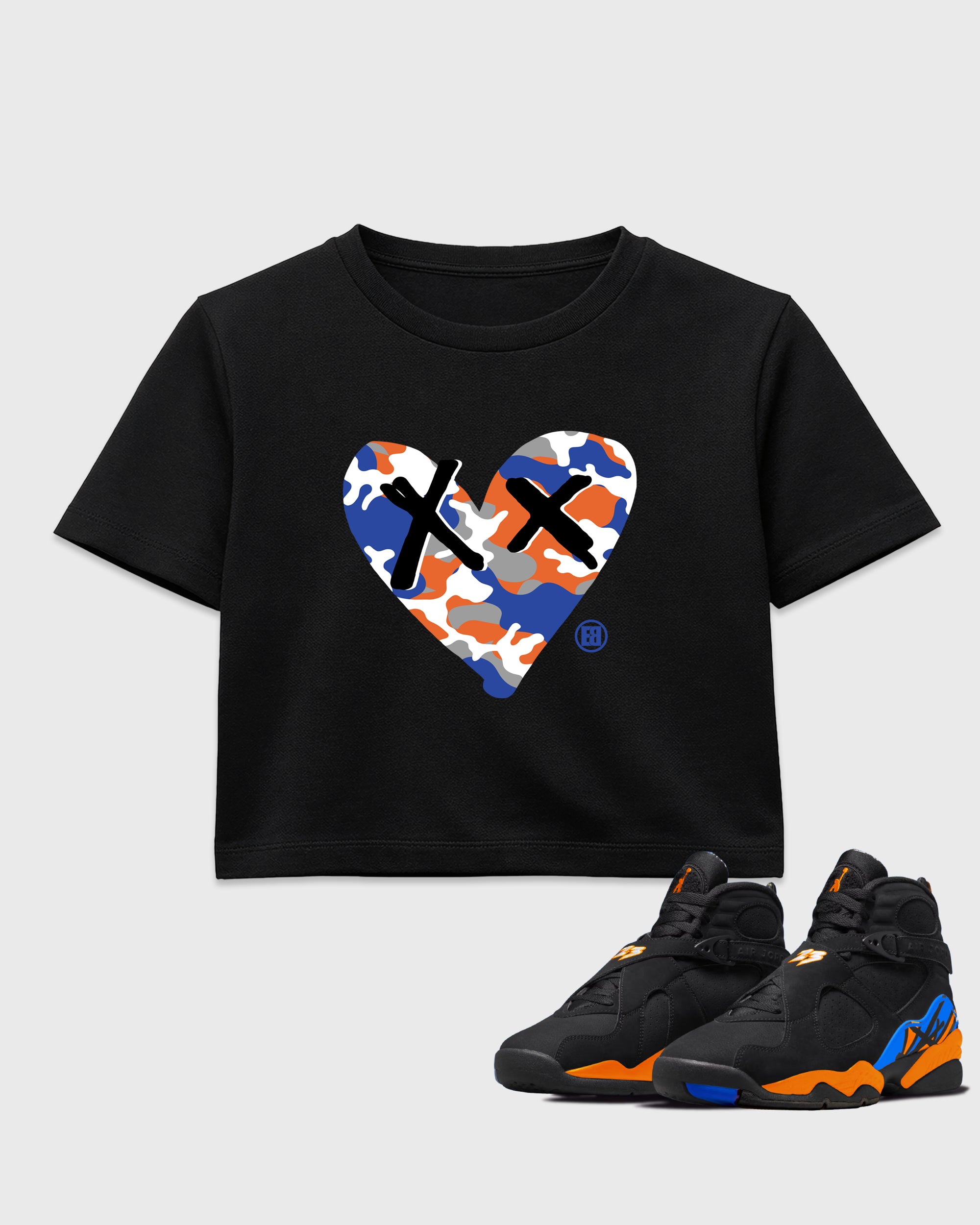 Camo Heart women’s crop tee designed to match the Air Jordan 8 Knicks, featuring coordinated Black 1 options for a perfect streetwear vibe.