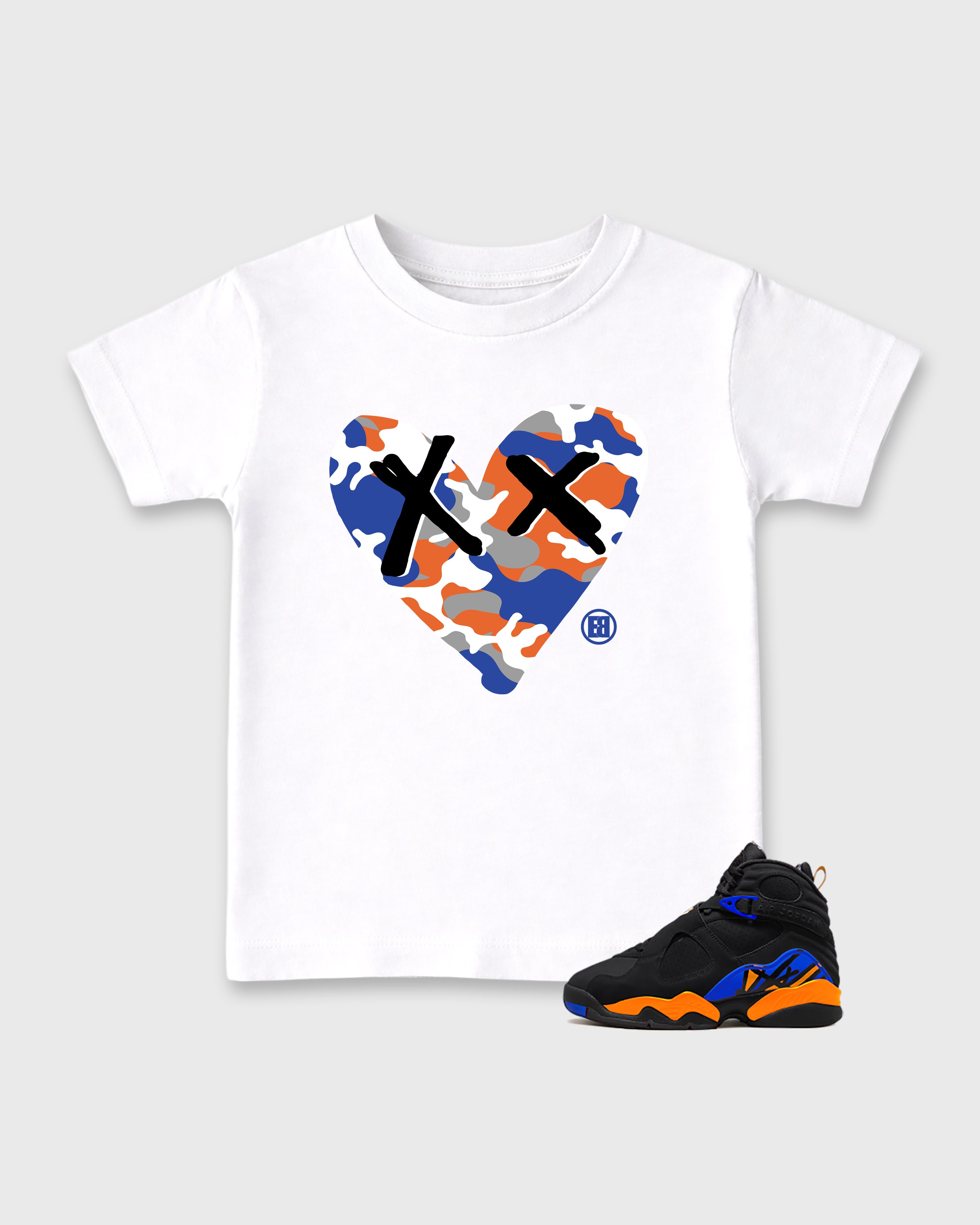 Camo Heart Baby & Kids Graphic T-Shirt featuring original artwork designed to match the Air Jordan 8 Knicks. White 1 Kids Graphic Tee.