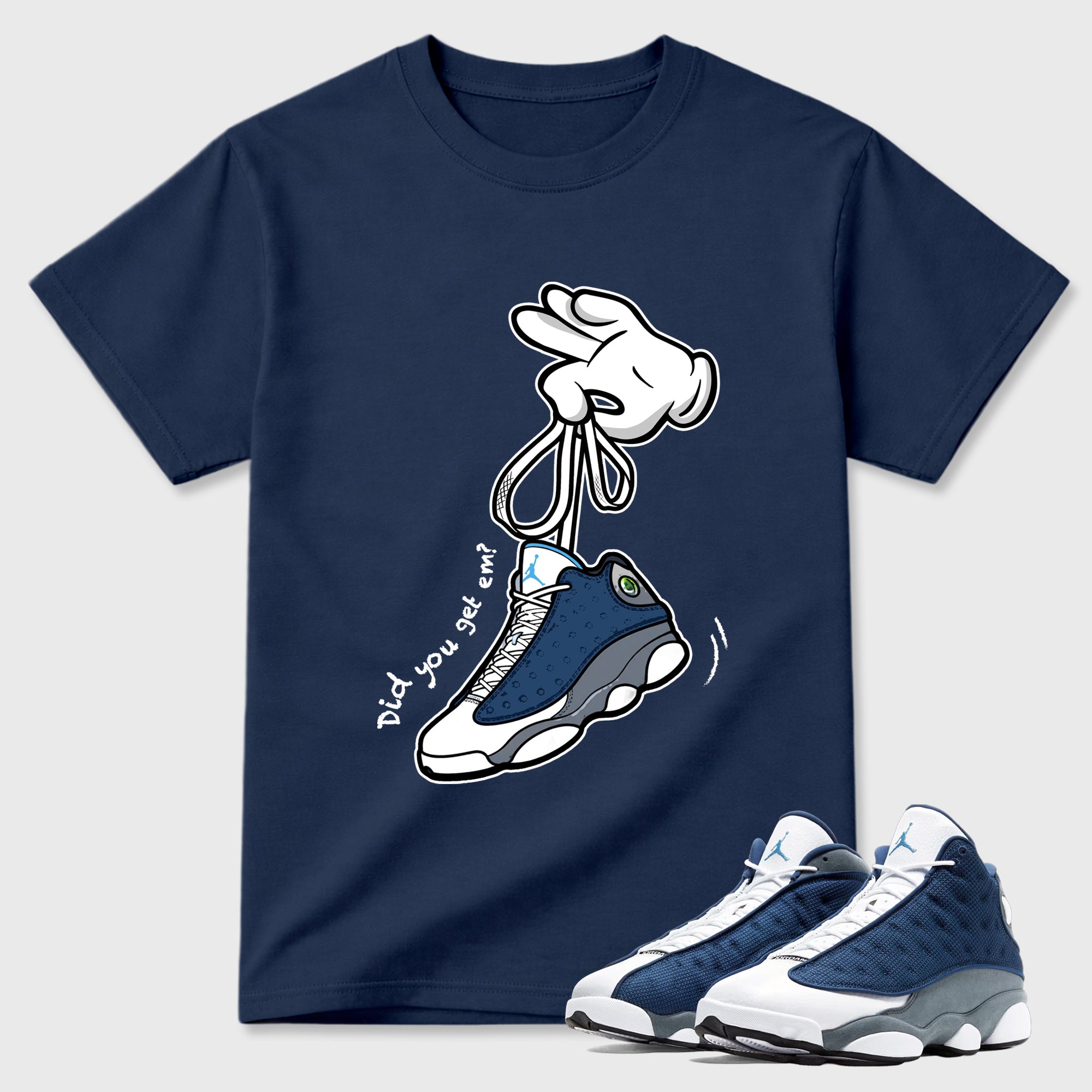 Cartoon Hands Graphic T-Shirt featuring original streetwear artwork designed to match the Air Jordan 13 Flint. Navy 1 Graphic T-Shirt.