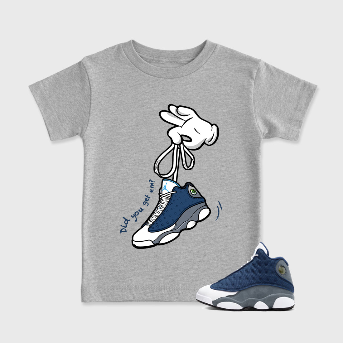 Cartoon Hands Baby & Kids Graphic T-Shirt featuring original artwork designed to match the Air Jordan 13 Flint. Heather Grey 1 Kids Graphic Tee.