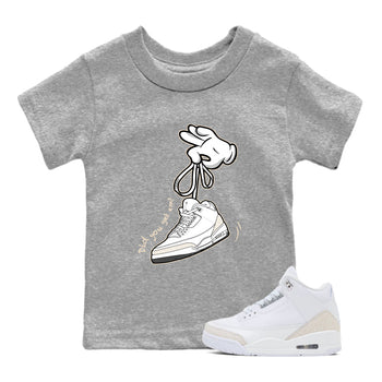 Cartoon Hands baby and kids t-shirt crafted for little sneakerheads to shine with the Air Jordan 3 Pure Money sneakers, displayed in Heather Grey 1.