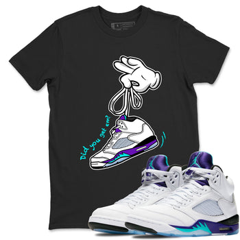 Cartoon Hands sneaker match t-shirt styled to complete your fit with the Air Jordan 5 Grape sneakers, shown in Black 1.