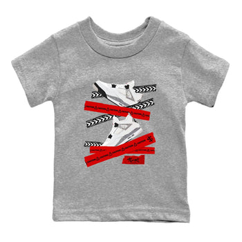 Caution Tape baby and kids t-shirt crafted for little sneakerheads to shine with the Air Jordan 4 White Cement sneakers, displayed in Heather Grey 2.