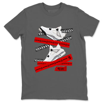 Caution Tape sneaker match t-shirt styled to complete your fit with the Air Jordan 4 White Cement sneakers, shown in Cool Grey 2.