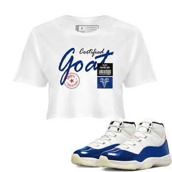 White t-shirt with 'Certified Goat' design and blue high-top sneakers on a white background
