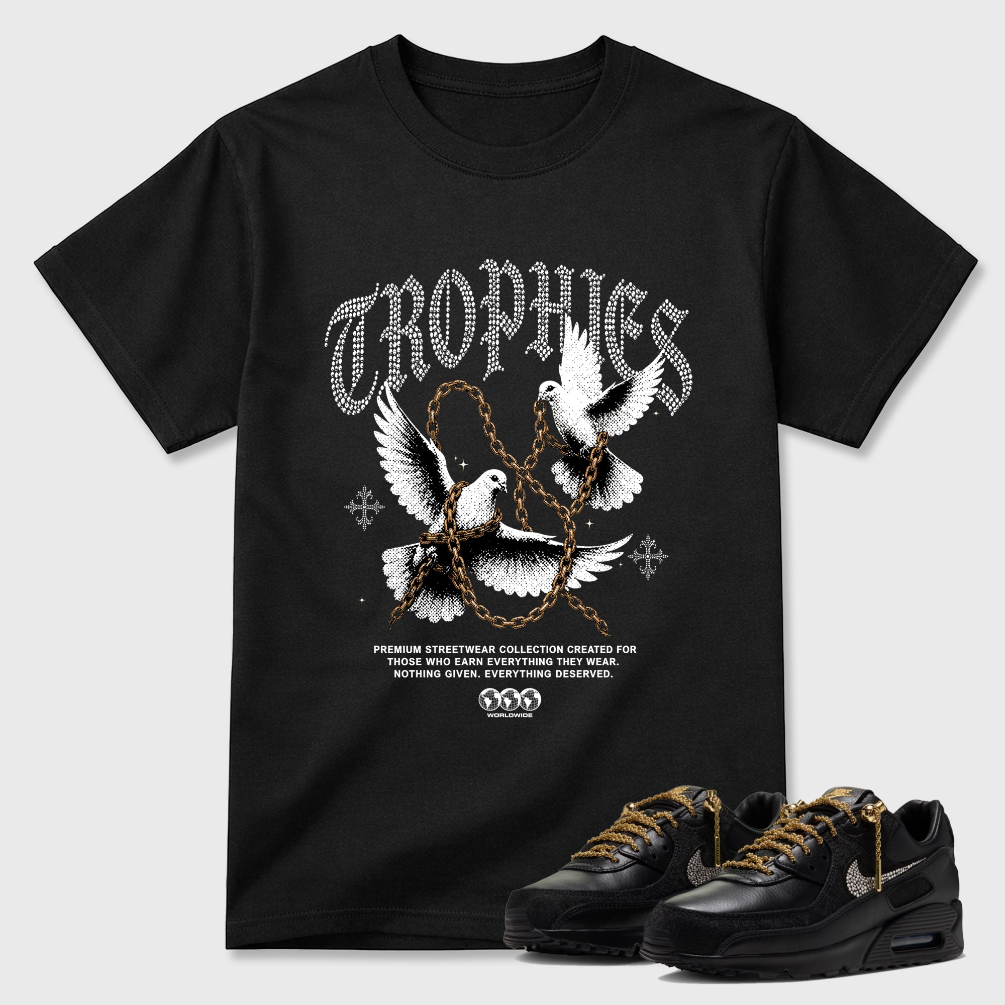 Chains of Glory Graphic T-Shirt featuring original streetwear artwork designed to match the Air Max 90 Trophies. Black 1 Graphic T-Shirt.