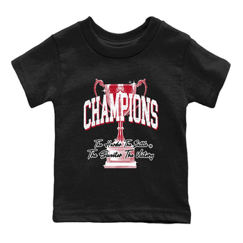 Champions Trophy baby and kids t-shirt crafted for little sneakerheads to shine with the Air Jordan 1 Ruby sneakers, displayed in Black 2.