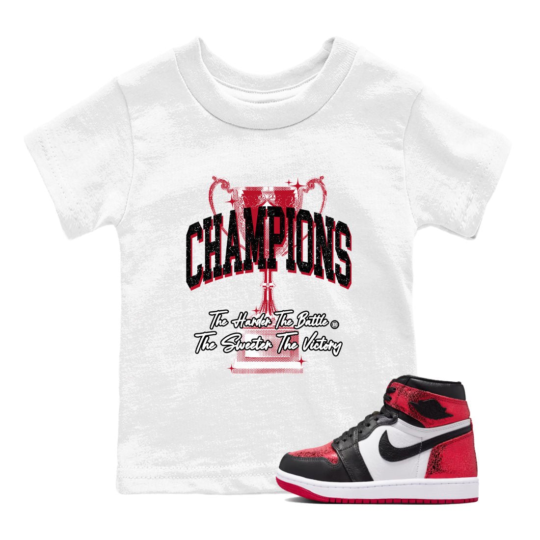 Champions Trophy baby and kids t-shirt crafted for little sneakerheads to shine with the Air Jordan 1 Ruby sneakers, displayed in White 1.