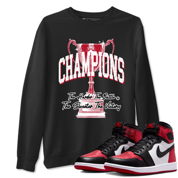 Champions Trophy sneaker match t-shirt styled to complete your fit with the Air Jordan 1 Ruby sneakers, shown in Black 1.