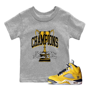 Champions Trophy baby and kids t-shirt crafted for little sneakerheads to with the Air Jordan 5 Tokyo sneakers, displayed in Heather Grey 1.