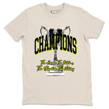 Champions Trophy sneaker match t-shirt styled to complete your fit with the Jordan Jumpman Jack Travis Scott Bright Cactus sneakers, shown in Natural 2.