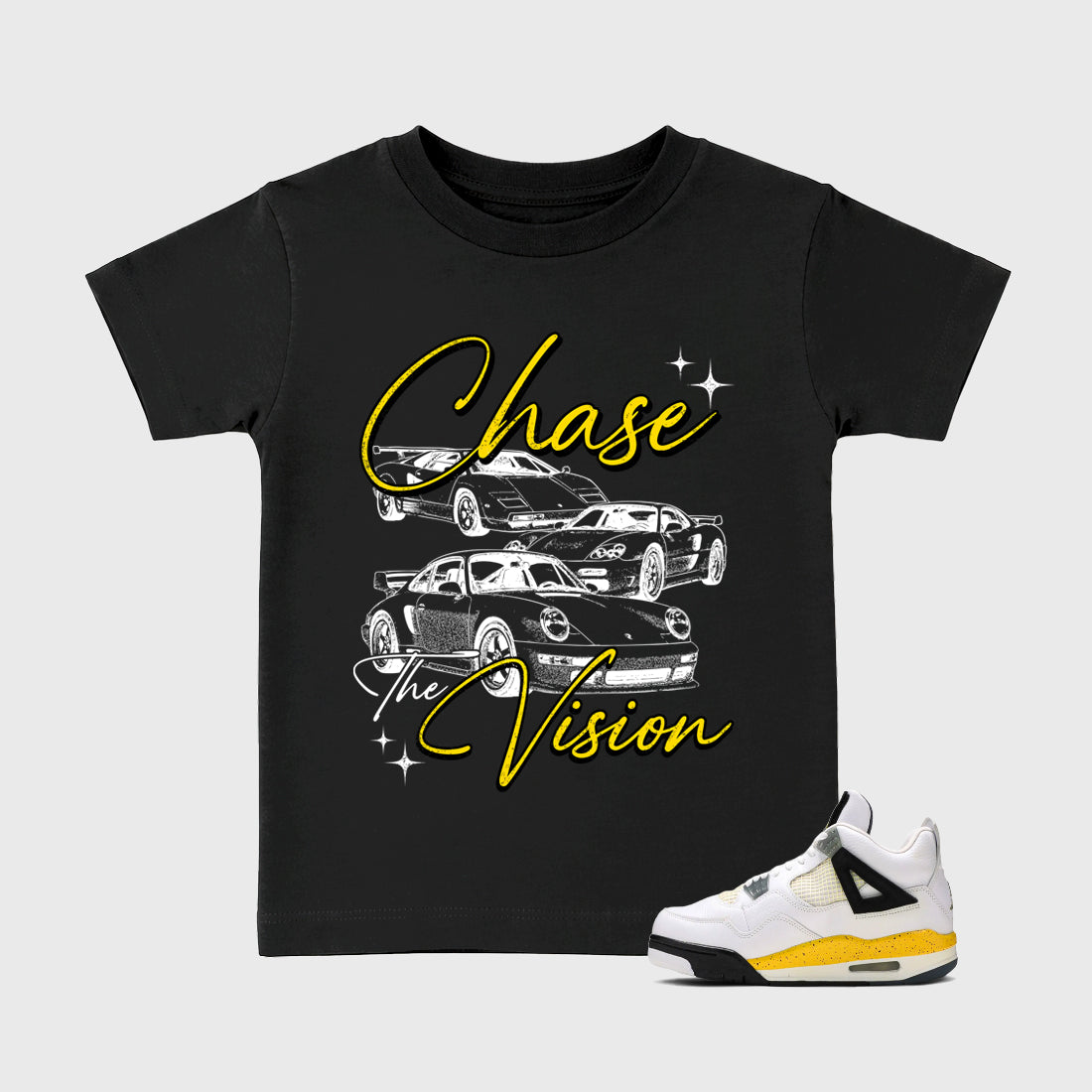 Chase The Vision Baby & Kids Graphic T-Shirt featuring original artwork designed to match the Air Jordan 4 Tour Yellow. Black 1 Kids Graphic Tee.