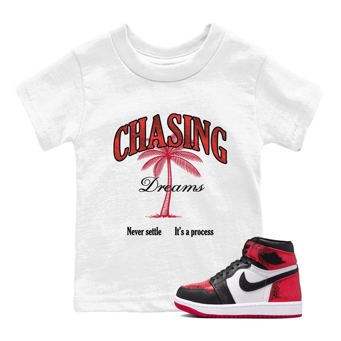 Chasing Dreams baby and kids t-shirt crafted for little sneakerheads to shine with the Air Jordan 1 Ruby sneakers, displayed in White 1.