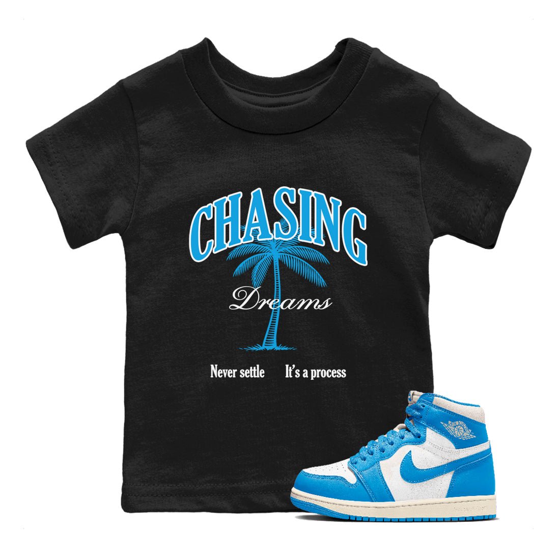 Chasing Dreams baby and kids t-shirt crafted for little sneakerheads to shine with the Air Jordan 1 UNC Reimagined sneakers, displayed in Black 1.
