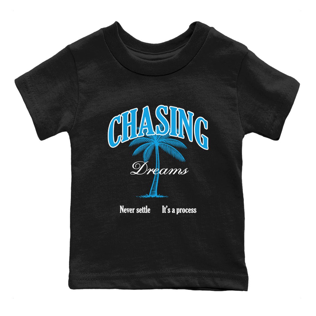 Chasing Dreams baby and kids t-shirt crafted for little sneakerheads to shine with the Air Jordan 1 UNC Reimagined sneakers, displayed in Black 2.