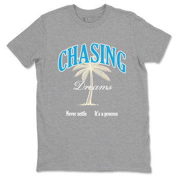 Chasing Dreams sneaker match t-shirt styled to complete your fit with the Air Jordan 1 UNC Reimagined sneakers, shown in Heather Grey 2.
