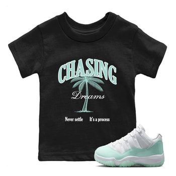 Chasing Dreams baby and kids t-shirt crafted for little sneakerheads to shine with the Air Jordan 11 Igloo sneakers, displayed in Black 1.