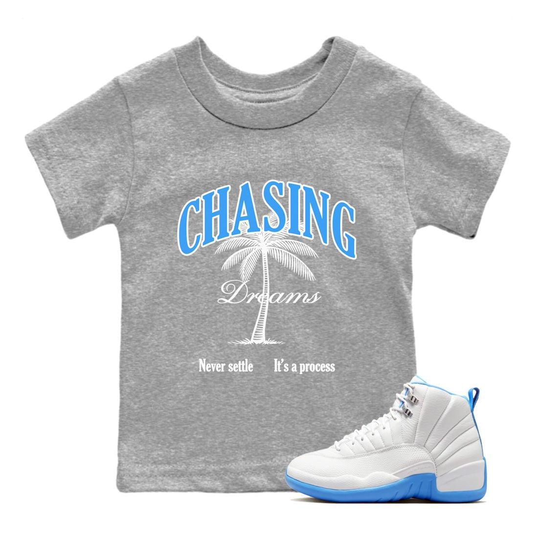 Chasing Dreams baby and kids t-shirt crafted for little sneakerheads to shine with the Air Jordan 12 White and University Blue sneakers, displayed in Heather Grey 1.