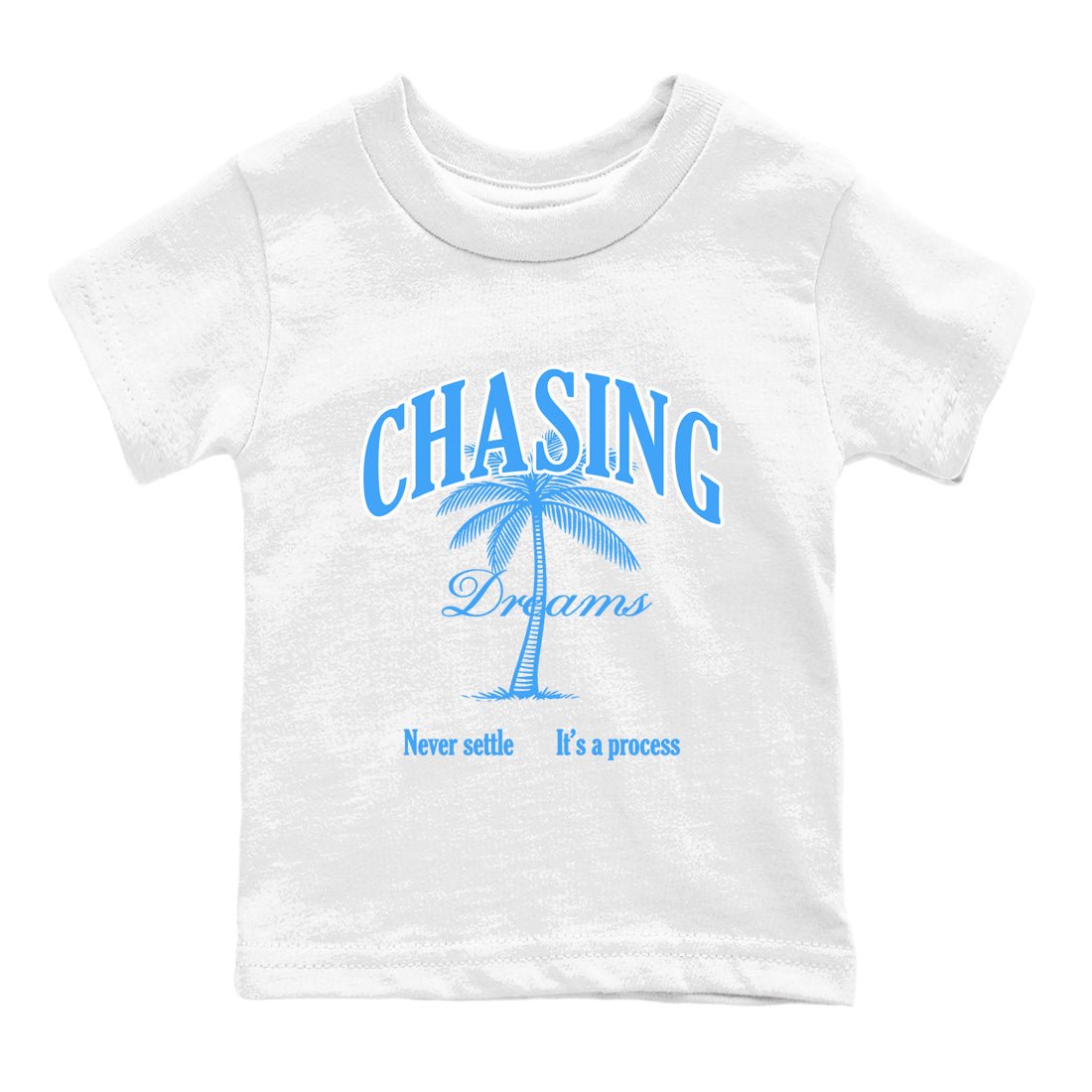 Chasing Dreams baby and kids t-shirt crafted for little sneakerheads to shine with the Air Jordan 12 White and University Blue sneakers, displayed in White 2.