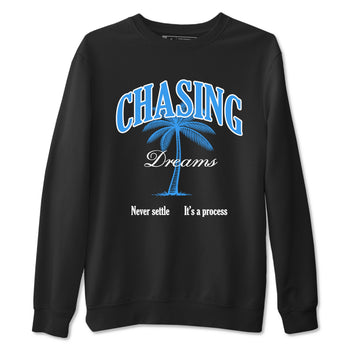 Chasing Dreams sneaker match t-shirt styled to complete your fit with the Air Jordan 12 White and University Blue sneakers, shown in Black 2.