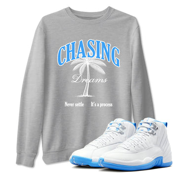 Chasing Dreams sneaker match t-shirt styled to complete your fit with the Air Jordan 12 White and University Blue sneakers, shown in Heather Grey 1.
