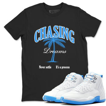 Chasing Dreams sneaker match t-shirt styled to complete your fit with the Air Jordan 12 White and University Blue sneakers, shown in Black 1.
