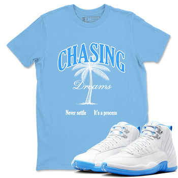 Chasing Dreams sneaker match t-shirt styled to complete your fit with the Air Jordan 12 White and University Blue sneakers, shown in Carolina Blue 1.