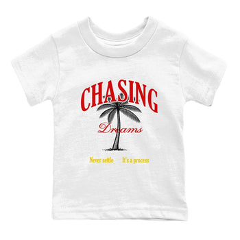 Chasing Dreams baby and kids t-shirt crafted for little sneakerheads to shine with the Air Jordan 14 Challenge Red sneakers, AJ14 Ferrari,  displayed in White 2.