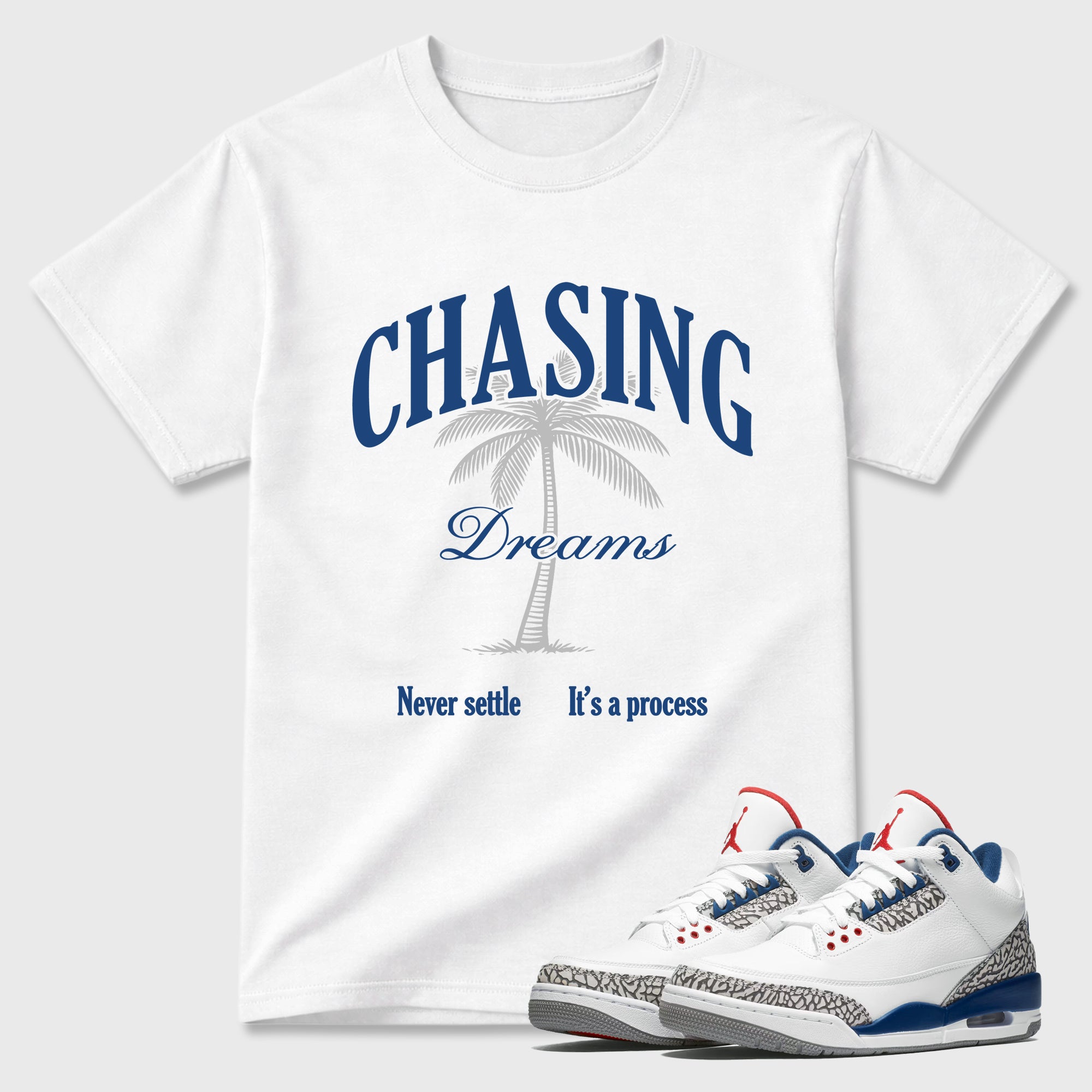 Chasing Dreams Graphic T-Shirt featuring original streetwear artwork designed to match the Air Jordan 3 True Blue. White 1 Graphic T-Shirt.