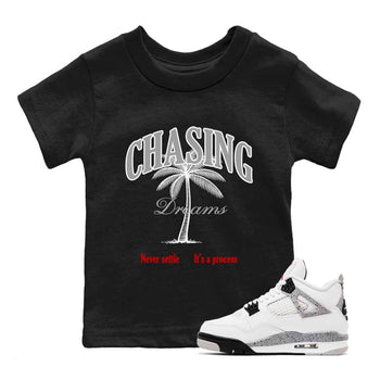 Chasing Dreams baby and kids t-shirt crafted for little sneakerheads to shine with the Air Jordan 4 White Cement sneakers, displayed in Black 1.