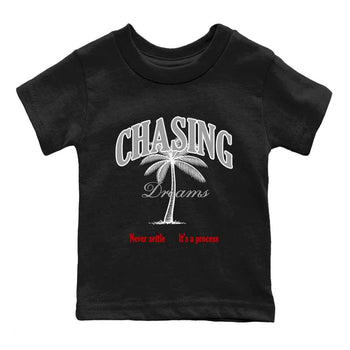 Chasing Dreams baby and kids t-shirt crafted for little sneakerheads to shine with the Air Jordan 4 White Cement sneakers, displayed in Black 2.