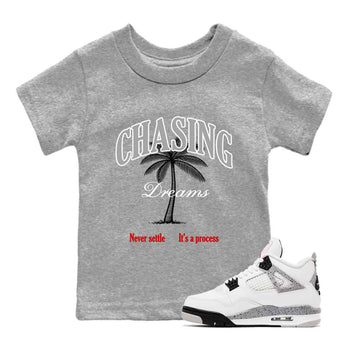 Chasing Dreams baby and kids t-shirt crafted for little sneakerheads to shine with the Air Jordan 4 White Cement sneakers, displayed in Heather Grey 1.