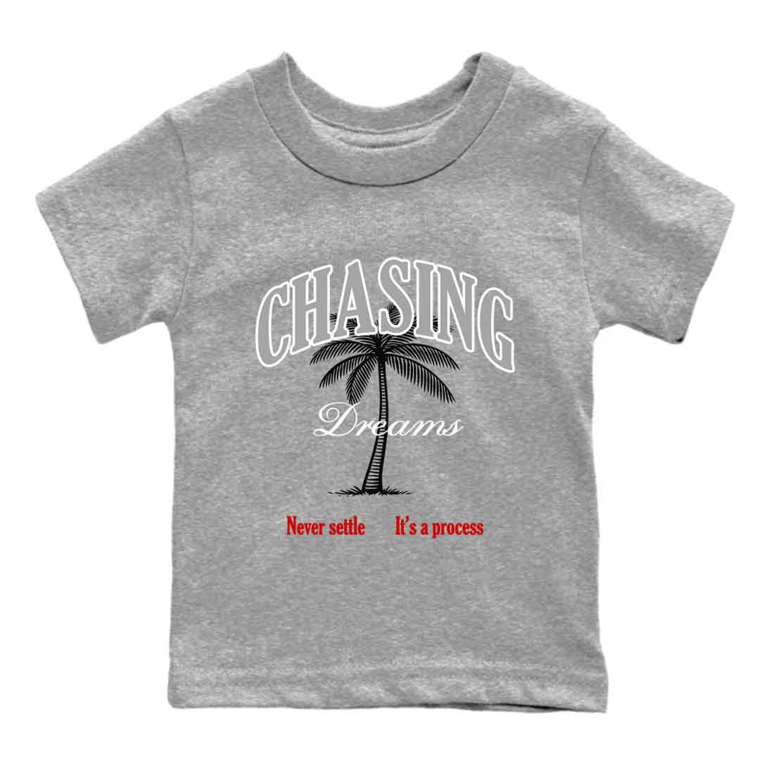 Chasing Dreams baby and kids t-shirt crafted for little sneakerheads to shine with the Air Jordan 4 White Cement sneakers, displayed in Heather Grey 2.