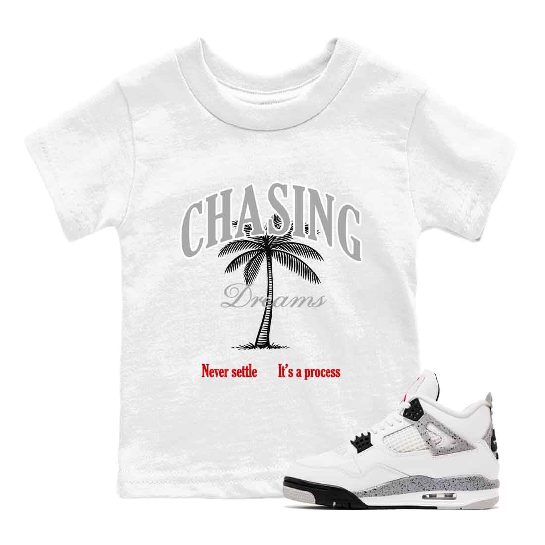 Chasing Dreams baby and kids t-shirt crafted for little sneakerheads to shine with the Air Jordan 4 White Cement sneakers, displayed in White 1.