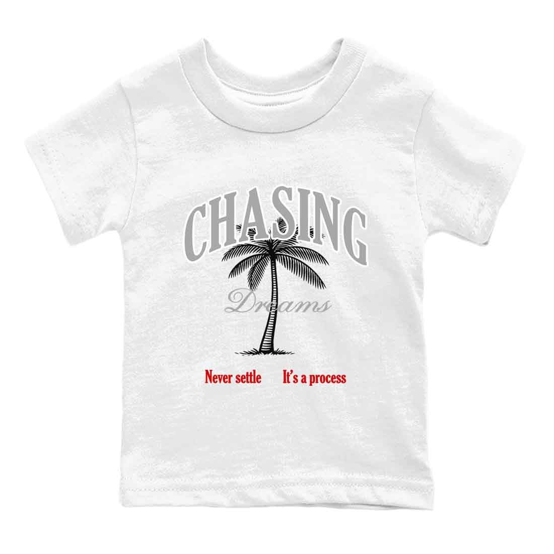Chasing Dreams baby and kids t-shirt crafted for little sneakerheads to shine with the Air Jordan 4 White Cement sneakers, displayed in White 2.