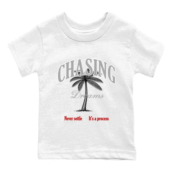 Chasing Dreams baby and kids t-shirt crafted for little sneakerheads to shine with the Air Jordan 4 White Cement sneakers, displayed in White 2.