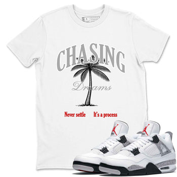 Chasing Dreams sneaker match t-shirt styled to complete your fit with the Air Jordan 4 White Cement sneakers, shown in White 1.