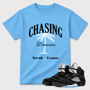 Chasing Dreams Graphic T-Shirt sneaker match tee designed for the Air Jordan 5 Black University Blue, featuring coordinated color options for a perfect streetwear match. Carolina Blue 1 shirt.