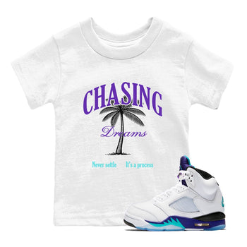 Chasing Dreams baby and kids t-shirt crafted for little sneakerheads to shine with the Air Jordan 5 Grape sneakers, displayed in White 1.