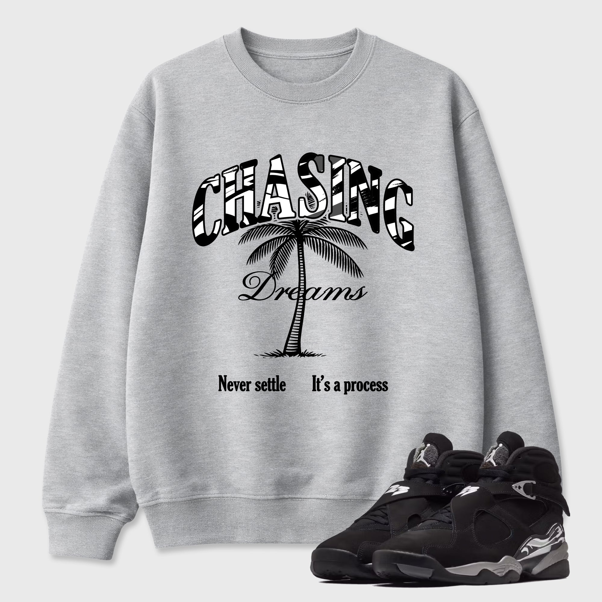 Chasing Dreams Graphic T-Shirt featuring original streetwear artwork designed to match the Air Jordan 8 Chrome. Heather Grey 1 Graphic Tee.