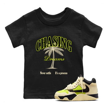 Chasing Dreams baby and kids t-shirt crafted for little sneakerheads to shine with the Jordan Jumpman Jack Travis Scott Bright Cactus sneakers, displayed in Black 1.